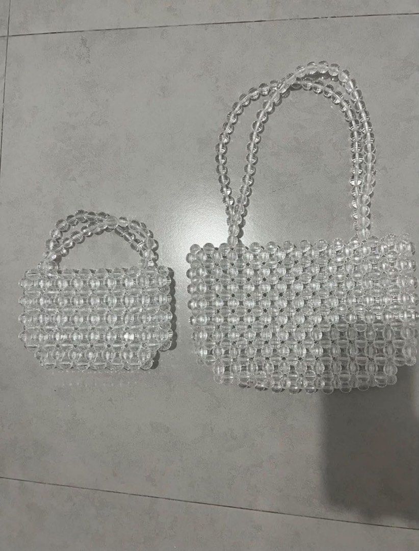 Clear Crystal Beaded Shoulder Bag (Category: Waste Bins & Bags) located in Manila. Submitted by happy.ashfinds (Listing ID 1460700763, Image 1). Description: 1,500 for both bag Buting pasig loc.