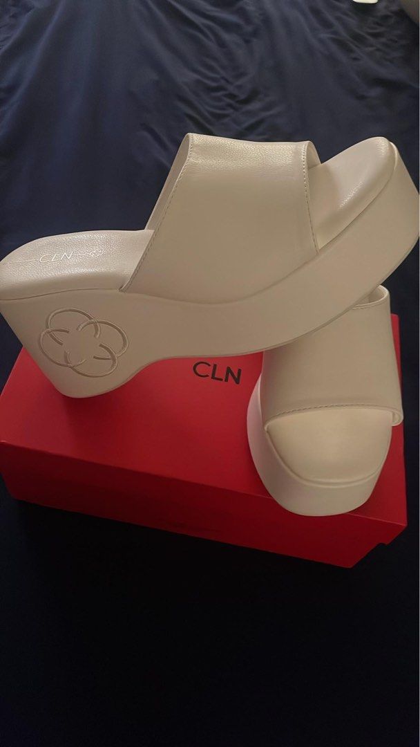 CLN 24H-Audrey Bone Platform Wedge Sandals Size 39 (Category: Wedges) located in Cavite. Submitted by honeysyruplime (Listing ID 1460512777, Image 2). Description: - Brand: CLN - Model: Audrey - Size: 39 - Color: Bone - Style: Platform wedge sandals - Features: Thick platform, simple front strap - Benefits: Adds height, retro vibe - Includes: Original box - Never been used - Original price: ₱1,450.