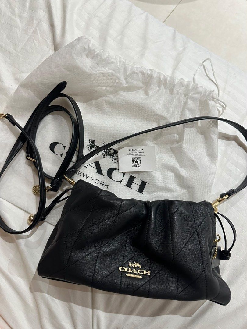 Coach Black Quilted Leather Drawstring Shoulder Bag (Category: Luxury Bags & Wallets) located in Manila. Submitted by denchoscloset (Listing ID 1460662875, Image 1). Description: perfectly mint/unused condition bag without flaws or signs of usage ❤️ bought it in japan used once only! Condition: 10/10 (pristine condition) Material: Ultra-soft quilted Nappa leather Details: Gold-tone horse & carriage hardware, beautiful scrunchable drawstring aesth