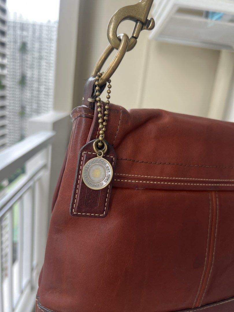 Coach Legacy Ali in Whiskey (Category: Shoulder Bags) located in Manila. Submitted by declutter_gurl (Listing ID 1460522667, Image 3). Description: 65th Anniversary Legacy style with brass hardware and signature multicolor stripe lining Loc: Pasig .