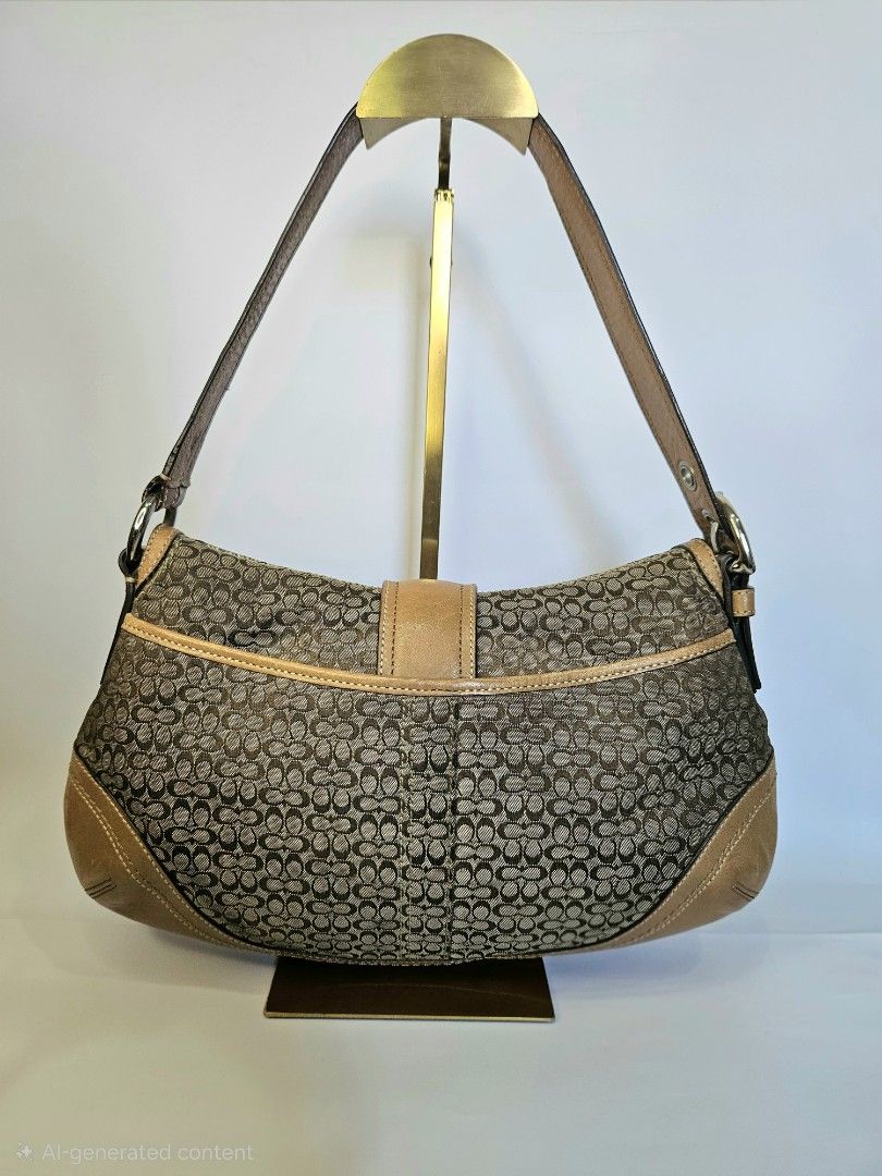 Coach Monogram Canvas Soho Bag & Wallet Set (Category: Luxury Bags & Wallets) located in Balanga. Submitted by prelovedat1stsight (Listing ID 1460656260, Image 2). Description: - Coach monogram canvas soho bag - Tan leather trim and strap - Silver buckle detail on front flap - Comes with a matching Coach monogram wallet - Ideal for everyday use - Bag features a shoulder strap - Wallet has a snap closure - Rank A condition.
