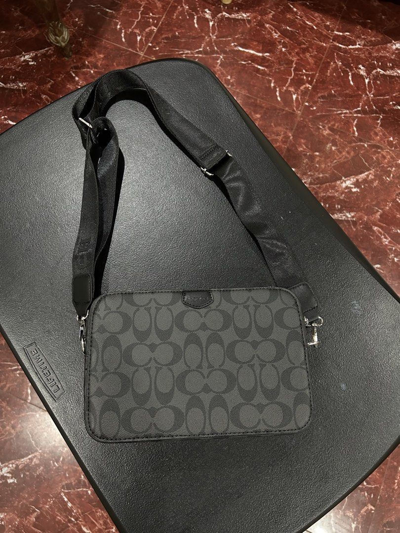 Coach Monogram Crossbody Bag Black (Category: Luxury Bags & Wallets) located in Manila. Submitted by drilskie0954204 (Listing ID 1460515944, Image 1). Description: - Authentic Coach crossbody bag - All-over signature monogram pattern - Secure zip closure - Adjustable strap for comfortable wear - Ideal for everyday use, fits all your essentials - Clean and simple design.