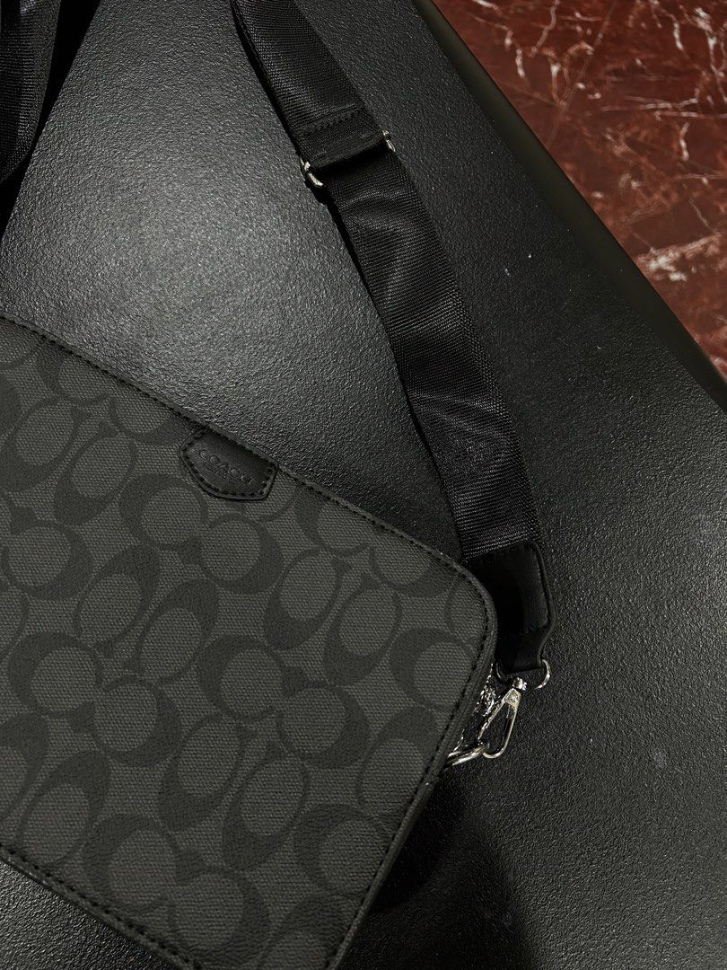 Coach Monogram Crossbody Bag Black (Category: Luxury Bags & Wallets) located in Manila. Submitted by drilskie0954204 (Listing ID 1460515944, Image 2). Description: - Authentic Coach crossbody bag - All-over signature monogram pattern - Secure zip closure - Adjustable strap for comfortable wear - Ideal for everyday use, fits all your essentials - Clean and simple design.