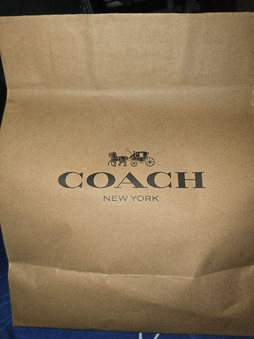 Coach New York Monogram Zip Around Wallet (Category: Wallets & Card holders) located in Manila. Submitted by nyaowz (Listing ID 1460556960, Image 2). Description: - Authentic Coach wallet - Signature monogram print - Black color - Zip-around closure - Compact size, ideal for cards and coins - Comes with original dust bag and shopping bag.