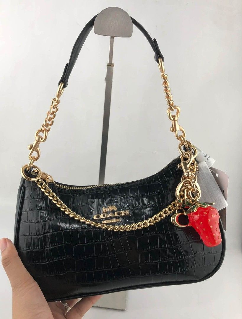 Coach Teri Shoulder Bag (Category: Shoulder Bags) located in Manila. Submitted by msddirectfactoryoutlet (Listing ID 1460613133, Image 1). Description: Teri Shoulder Bag 9 1/2” (L) x 6” (H) x 3” (W) US Grade 100%.