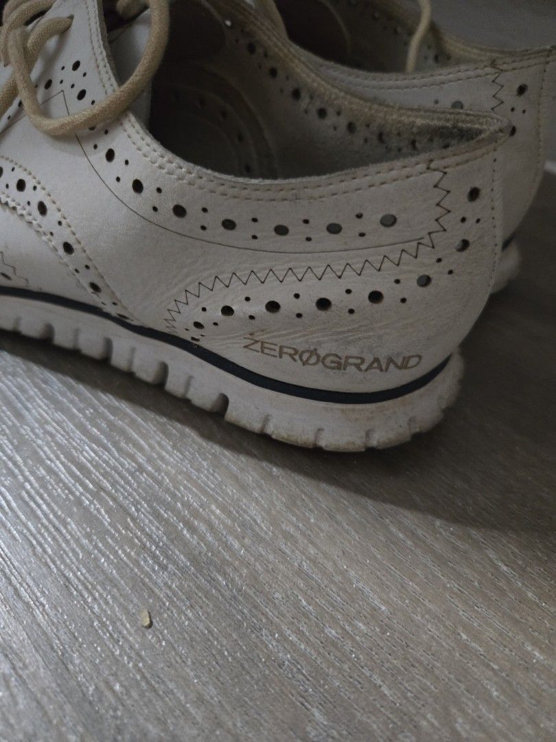 Cole Haan Zerogrand White (Category: Loafers) located in Manila. Submitted by luxtimeless (Listing ID 1460543725, Image 2). Description: Authentic Cole Haan Zerogrand white - Size 7 or 23.5cm - Red accents on heel tabs and sole Note: Soles show some signs of wear.