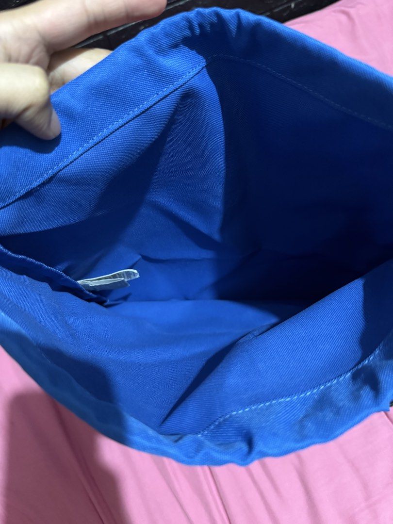 Columbia Blue Drawstring Bag (Category: Backpacks) located in Taguig. Submitted by bader05 (Listing ID 1460572658, Image 2). Description: - Blue Columbia drawstring bag - Features printed Columbia logo on the front - Interior is also blue - Comes with an attached warranty tag - Perfect for gym sessions or everyday errands.