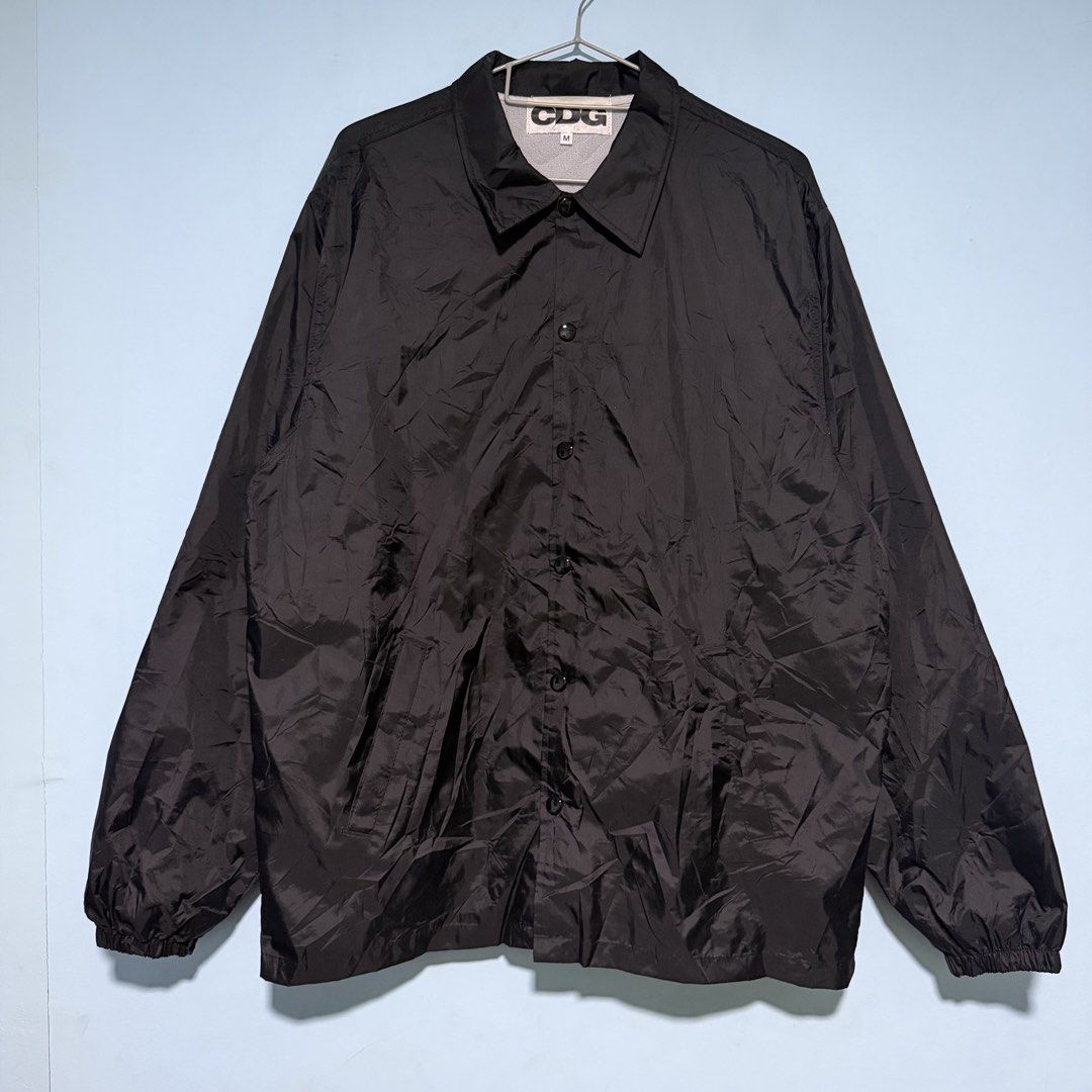 COMME DES GARCONS COACH JACKET (Category: Coats, Jackets and Outerwear) located in Cagayan de Oro. Submitted by kent_ogals (Listing ID 1460655709, Image 2). Description: COMME DES GARCONS COACH JACKET SIZE MEDIUM DIMENSION 23.5x28 VERYGOOD - EXCELLENT CONDITION ISSUE: SEE LAST PIC (Slight hairline in print due to fold) .