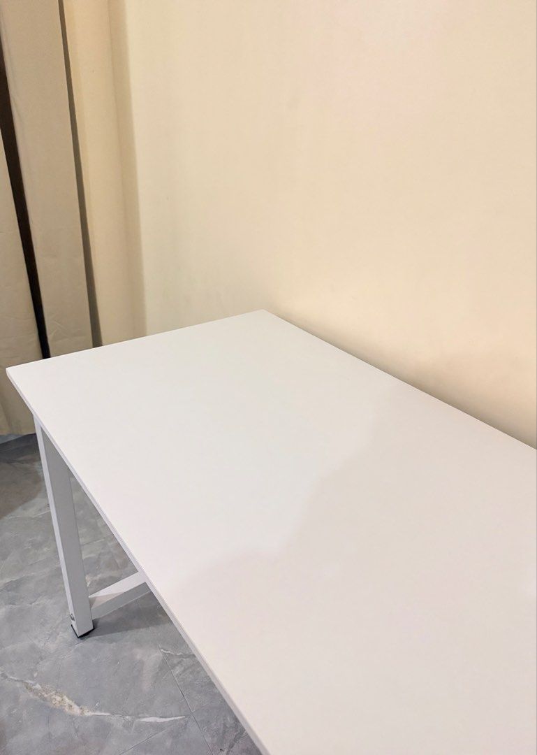 Computer desk / White table 140/60/70cm - price nego (Category: Office Furniture & Fixtures) located in Manila. Submitted by xbph_ (Listing ID 1460561596, Image 3). Description: Computer desk / White table 140/60/70cm - price nego hello!! baka may interested to buy this white table 🤍 ₱1,540 nego used for 5 months size/dimensions: see photo minor scratches on one corner (see photo) adhesive hooks underneath, removable upon request kindly dm me fo