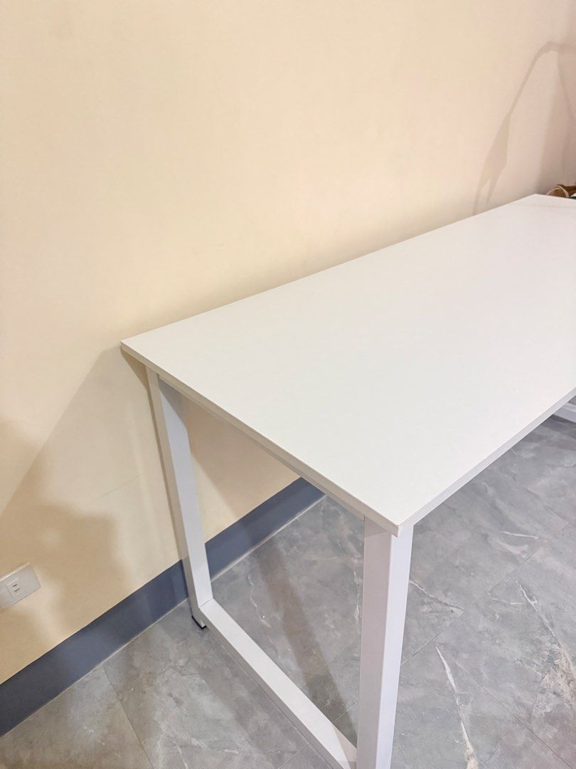 Computer desk / White table 140/60/70cm - price nego (Category: Office Furniture & Fixtures) located in Manila. Submitted by xbph_ (Listing ID 1460561596, Image 2). Description: Computer desk / White table 140/60/70cm - price nego hello!! baka may interested to buy this white table 🤍 ₱1,540 nego used for 5 months size/dimensions: see photo minor scratches on one corner (see photo) adhesive hooks underneath, removable upon request kindly dm me fo