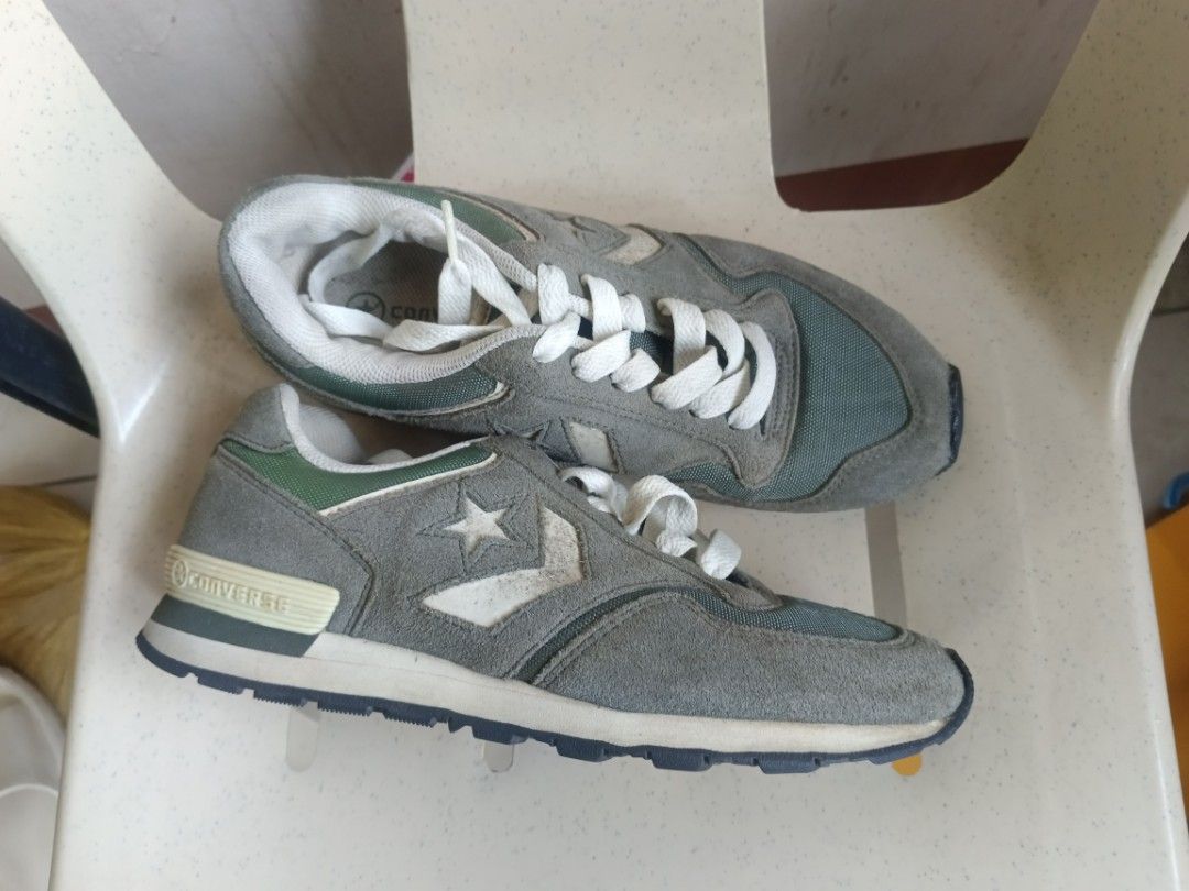 Converse Sneakers Grey Suede (Category: Sneakers) located in Kapatagan. Submitted by corsethrift (Listing ID 1460554167, Image 1). Description: - Needs a bit of cleaning - Grey Converse sneakers - Suede and mesh material - White laces - Classic star logo on the side - Rubber sole with Converse branding - Ideal for casual wear - Shows some signs of wear, but plenty of life left.