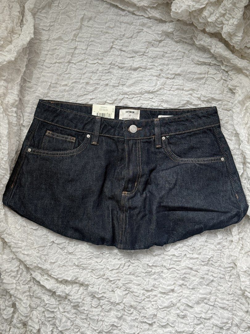 Cotton on bubble skirt denim (Category: Skirts) located in Manila. Submitted by prelovedby_lou (Listing ID 1460589617, Image 1). Description: - price on tag: 1,999 - never been worn - bought from cotton on - 26 on tag but can fit until 30 for hips (for low waisted).