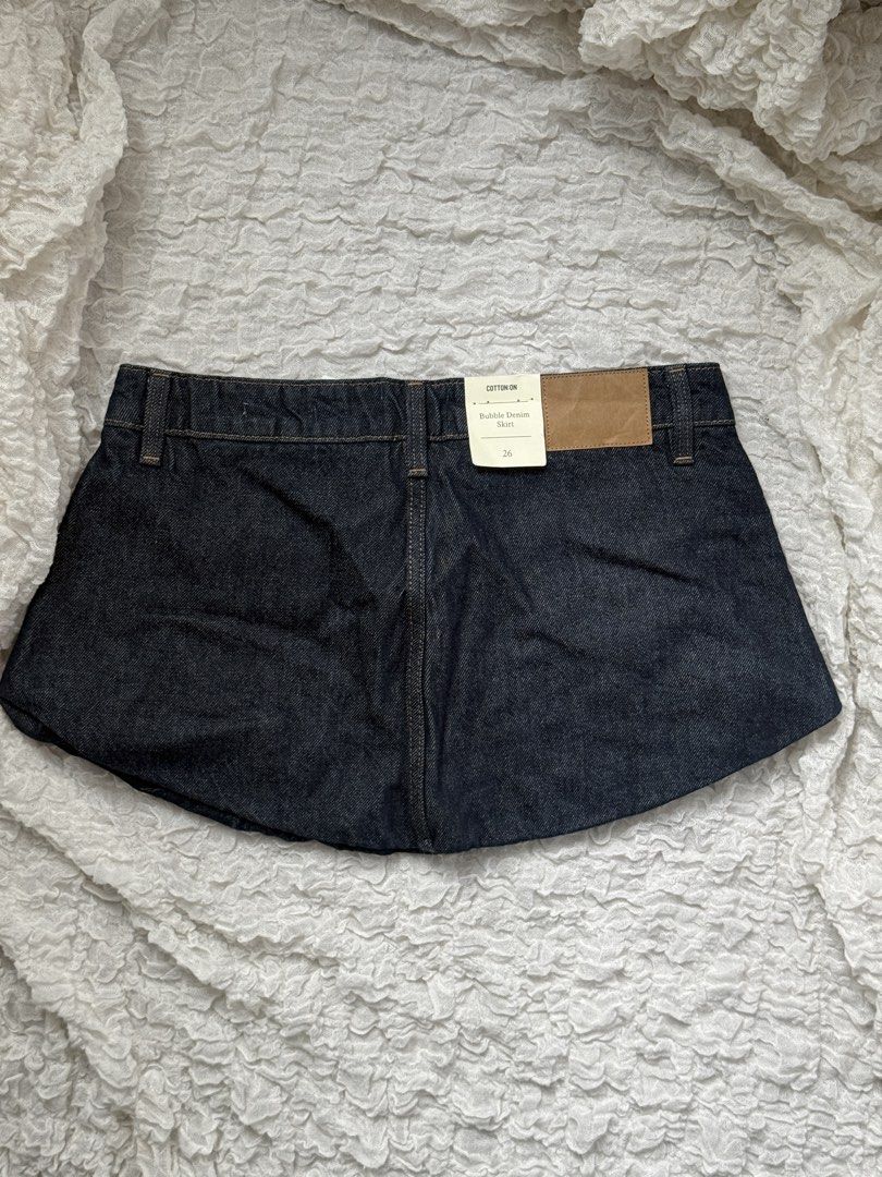 Cotton on bubble skirt denim (Category: Skirts) located in Manila. Submitted by prelovedby_lou (Listing ID 1460589617, Image 2). Description: - price on tag: 1,999 - never been worn - bought from cotton on - 26 on tag but can fit until 30 for hips (for low waisted).