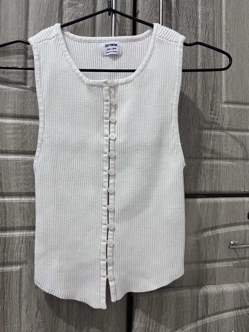 Cotton On Button Down Rib Vest (Category: Others Tops) located in Manila. Submitted by zealgem_705b08 (Listing ID 1460638332, Image 1). Description: -Used one time only - No defect or flaw Reason for selling: Don’t use anymore Mode of Payment: Gcash Mode of Delivery: Lalamove Location: Manila.