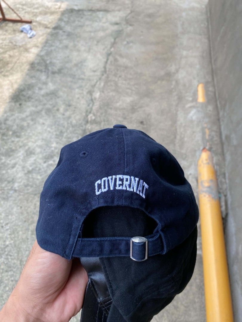 COVERNATO Navy Blue Cap with 'C' Logo (Category: Caps & Hats) located in Tangub. Submitted by brightfire_c293e4 (Listing ID 1460667837, Image 3). Description: - Brand: Covernat - Color: Navy Blue - Design: Baseball cap - Features: White embroidered 'C' on front, 'Covernat' embroidery on back - Fit: Adjustable strap at the back - Style: Simple, classic, great for everyday wear.