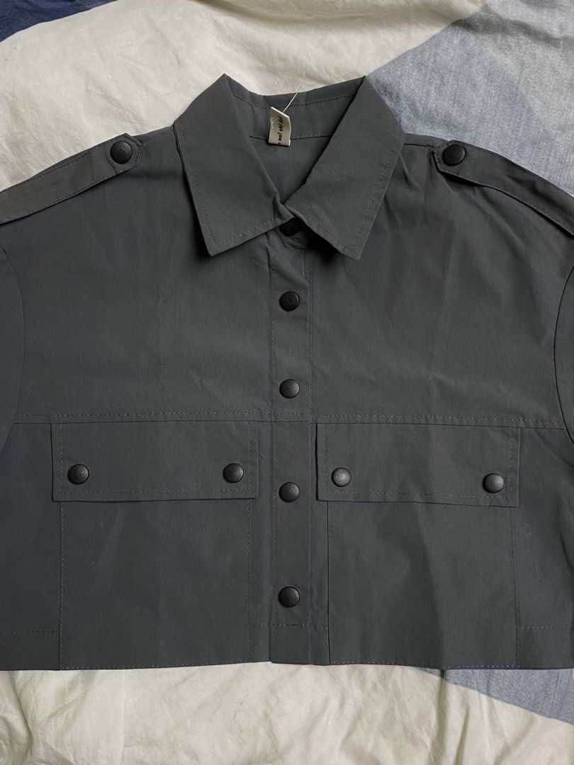cropped utility polo (Category: Coats, Jackets and Outerwear) located in Manila. Submitted by beefparatha (Listing ID 1460617201, Image 1). Description: decluttering. never wore this bc wrong size. the material used here is great. pit to pit: 18.5 inches length: 16 inches.