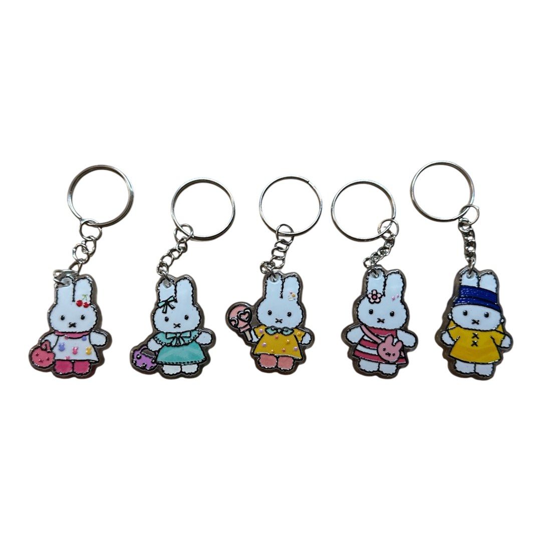 Usahana and other acrylic designs (Category: Character Goods) located in Quezon City. Submitted by ghessie (Listing ID 1460692529, Image 2). Description: ₱39.00 each 🔗 **Available in Silver & Gold Chains** ✨ **Embossed pendants with unique designs** 🎀 Assorted styles and designs to choose from 💎 Stylish, cute, and elegant look 👜 Perfect for **bag charms, keychains, gifts, and DIY projects** 💕 Beautifully designed and easy to match with your 