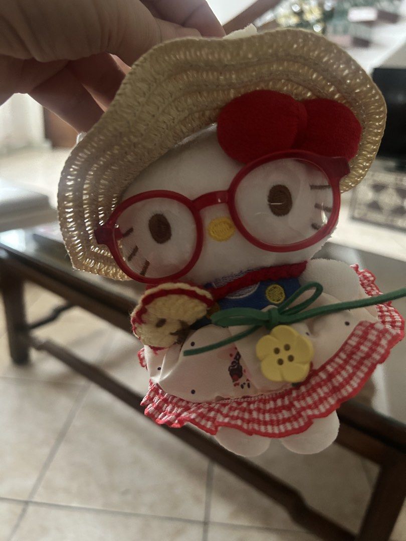 Cute Hello Kitty Plush Keychain with Straw Hat and Glasses (Category: Plushies & Soft Toys) located in Quezon City. Submitted by asiaco (Listing ID 1460562049, Image 3). Description: Cute Kitty plush keychain with straw hat and red glasses. Features a gingham and floral dress. Comes with a blue carabiner clip. Perfect for bags and keys..