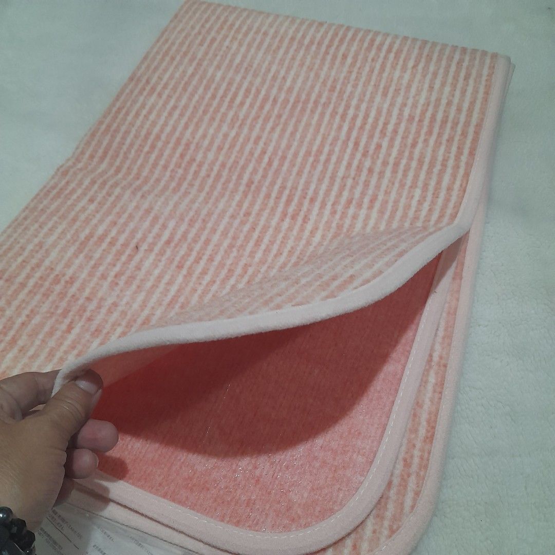 Daiso Silver Ion Deodorizing Pet Mat (Category: Homes & Other Pet Accessories) located in Bocaue. Submitted by marajapansurplus (Listing ID 1460526687, Image 3). Description: - Daiso Pet Mat - Color: Pink with white stripes - Benefits: Keeps pet's space fresh and odor-free - Maintenance: Easy to clean and maintain - Size: Good for pet areas.