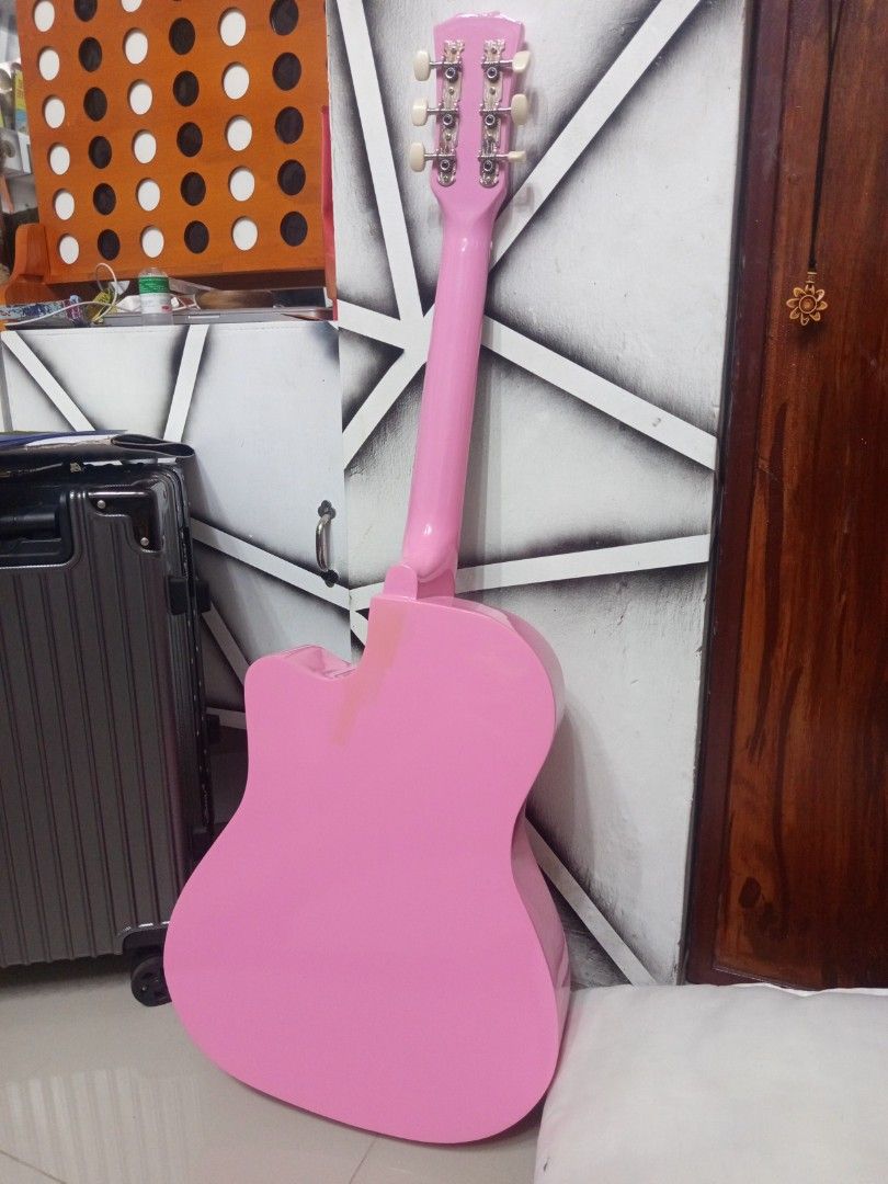 Davis Pink Guitar (JG-38C/PI) (Category: Musical Instruments) located in Rizal. Submitted by francisozo (Listing ID 1460691615, Image 2). Description: An Davis hand-made pink acoustic guitar, perfect for jamming out while in its pink and cute aesthetic RFS: This was an gift years ago from a friend but unfortunately I almost never used it, I hope this guitar gets to bring out more melodies, tunes, and songs in your hands Price is negotiable Meet-u