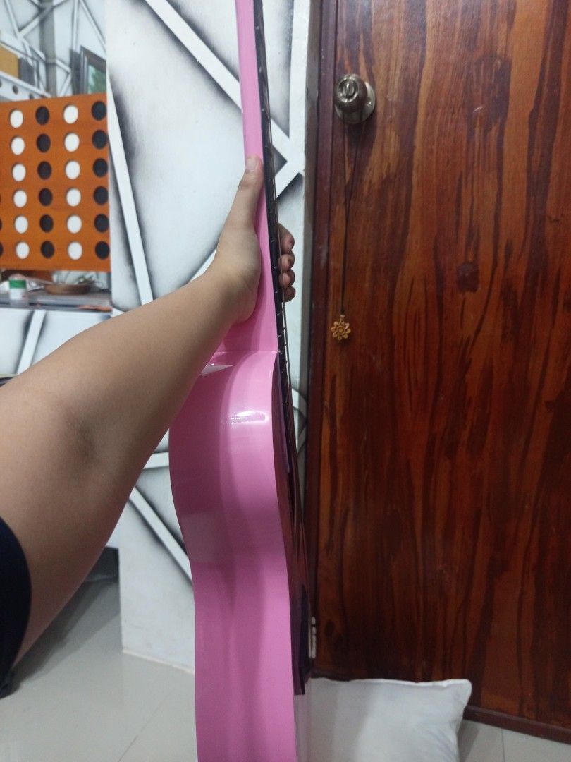Davis Pink Guitar (JG-38C/PI) (Category: Musical Instruments) located in Rizal. Submitted by francisozo (Listing ID 1460691615, Image 3). Description: An Davis hand-made pink acoustic guitar, perfect for jamming out while in its pink and cute aesthetic RFS: This was an gift years ago from a friend but unfortunately I almost never used it, I hope this guitar gets to bring out more melodies, tunes, and songs in your hands Price is negotiable Meet-u