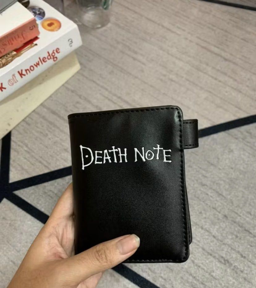 Death Note Black Bifold Wallet (Category: Wallets & Card holders) located in Makati City. Submitted by ellope (Listing ID 1460692580, Image 1). Description: Death Note bifold wallet with logo. Features ID slot and zippered compartment. .