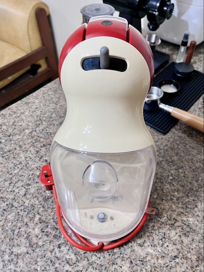 DeLonghi Nescafé Dolce Gusto Coffee Machine (Category: Other Kitchen Appliances) located in Manila. Submitted by stefan.056 (Listing ID 1460705714, Image 3). Description: Machine still works and can use pods Reusable coffee capsule included Rfs: decluttering Issues: Missing drip tray, yellowing, and scratches Can be used for parts e.g. pump replacement shipping via lalamove only .