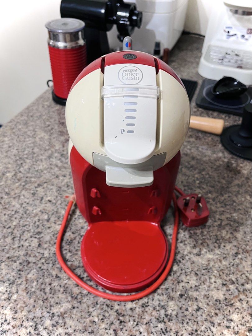 DeLonghi Nescafé Dolce Gusto Coffee Machine (Category: Other Kitchen Appliances) located in Manila. Submitted by stefan.056 (Listing ID 1460705714, Image 1). Description: Machine still works and can use pods Reusable coffee capsule included Rfs: decluttering Issues: Missing drip tray, yellowing, and scratches Can be used for parts e.g. pump replacement shipping via lalamove only .