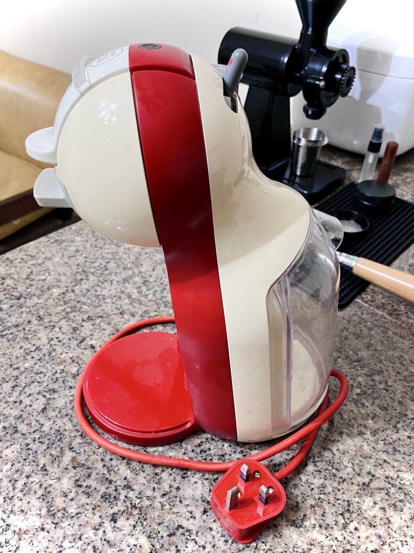 DeLonghi Nescafé Dolce Gusto Coffee Machine (Category: Other Kitchen Appliances) located in Manila. Submitted by stefan.056 (Listing ID 1460705714, Image 2). Description: Machine still works and can use pods Reusable coffee capsule included Rfs: decluttering Issues: Missing drip tray, yellowing, and scratches Can be used for parts e.g. pump replacement shipping via lalamove only .