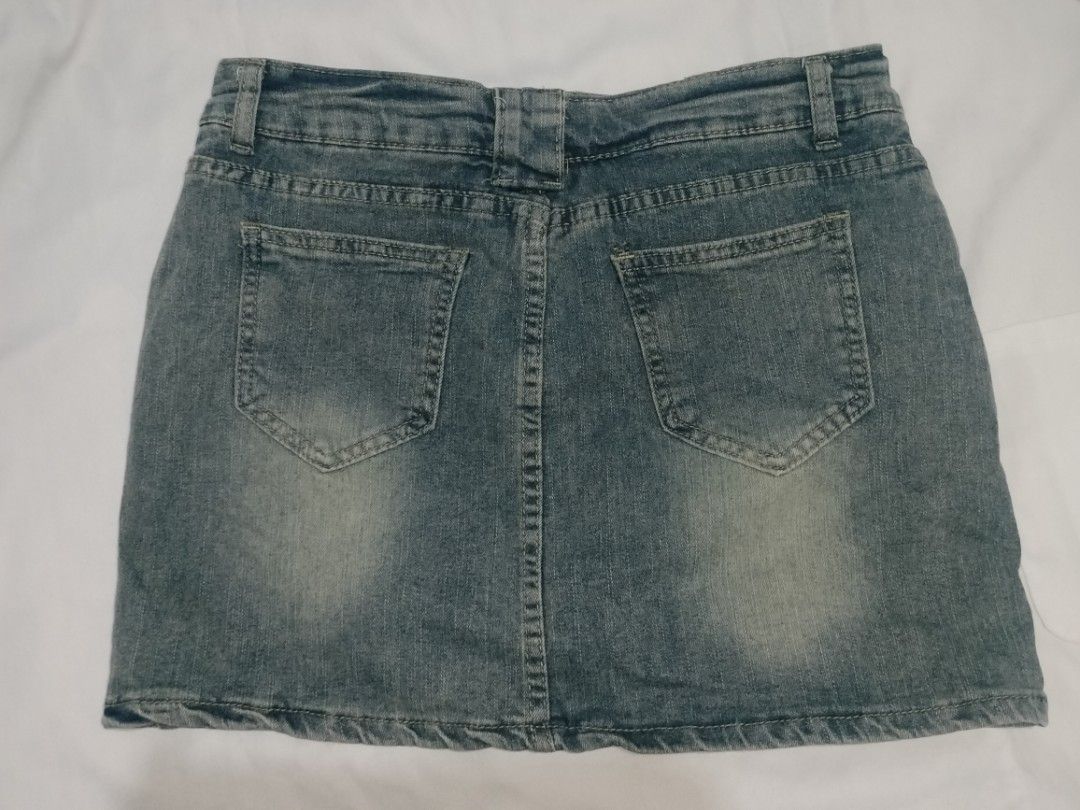 Denim Mini Skirt 26-27 (Category: Skirts) located in Quezon City. Submitted by mccchs (Listing ID 1460655004, Image 2). Description: waist: 26-27 length: 13 - with inner short - has minor flaw (yellowish stain, see at last slide) - color may vary due to lighting.