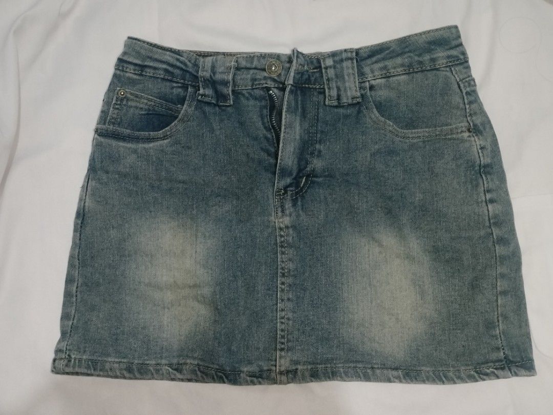 Denim Mini Skirt 26-27 (Category: Skirts) located in Quezon City. Submitted by mccchs (Listing ID 1460655004, Image 1). Description: waist: 26-27 length: 13 - with inner short - has minor flaw (yellowish stain, see at last slide) - color may vary due to lighting.