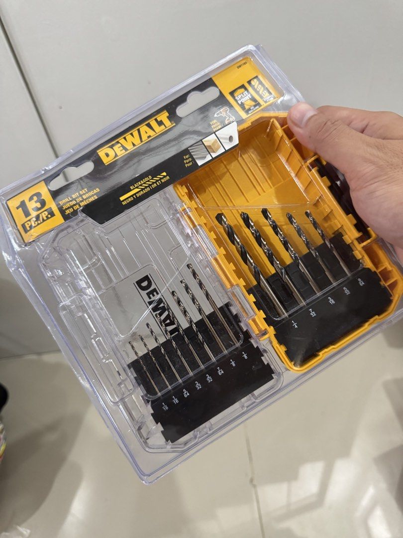 DEWALT 13-Piece Black & Gold Drill Bit Set (Category: Construction Tools & Equipment) located in Cavite. Submitted by reygab (Listing ID 1460511050, Image 1). Description: - 13-piece DeWalt Black & Gold drill bit set - Features split point bits for precise drilling - Ideal for wood and various materials - Comes in a durable yellow case - All bits clearly marked with sizes Can shipped .