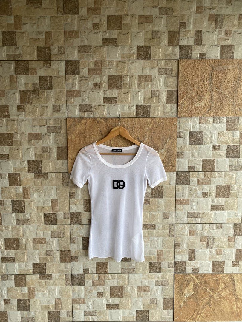D&G - MESH SEE THROUGH SHIRT (Category: Shirts) located in Bacolod City. Submitted by timelessbyjosh (Listing ID 1460591325, Image 3). Description: BEST FOR Y2K OUTFITS SIZE : 40 ACTUAL COLOR : WHITE & BLACK COLOR RATE : 10 OUT OF 10 CONDITION : NEAR NEW MATERIAL : 88 % COTTON , 2 % SPANDEX & 10 % SILK MADE IN : ITALY FLAWS : NONE DIMENSIONS LENGTH - 26 WIDTH ( ARMPIT TO ARMPIT ) - 15 - SAFE TO STRETCH FABRIC MEASUREMENT TAKEN WHILE LAYING FLAT. 