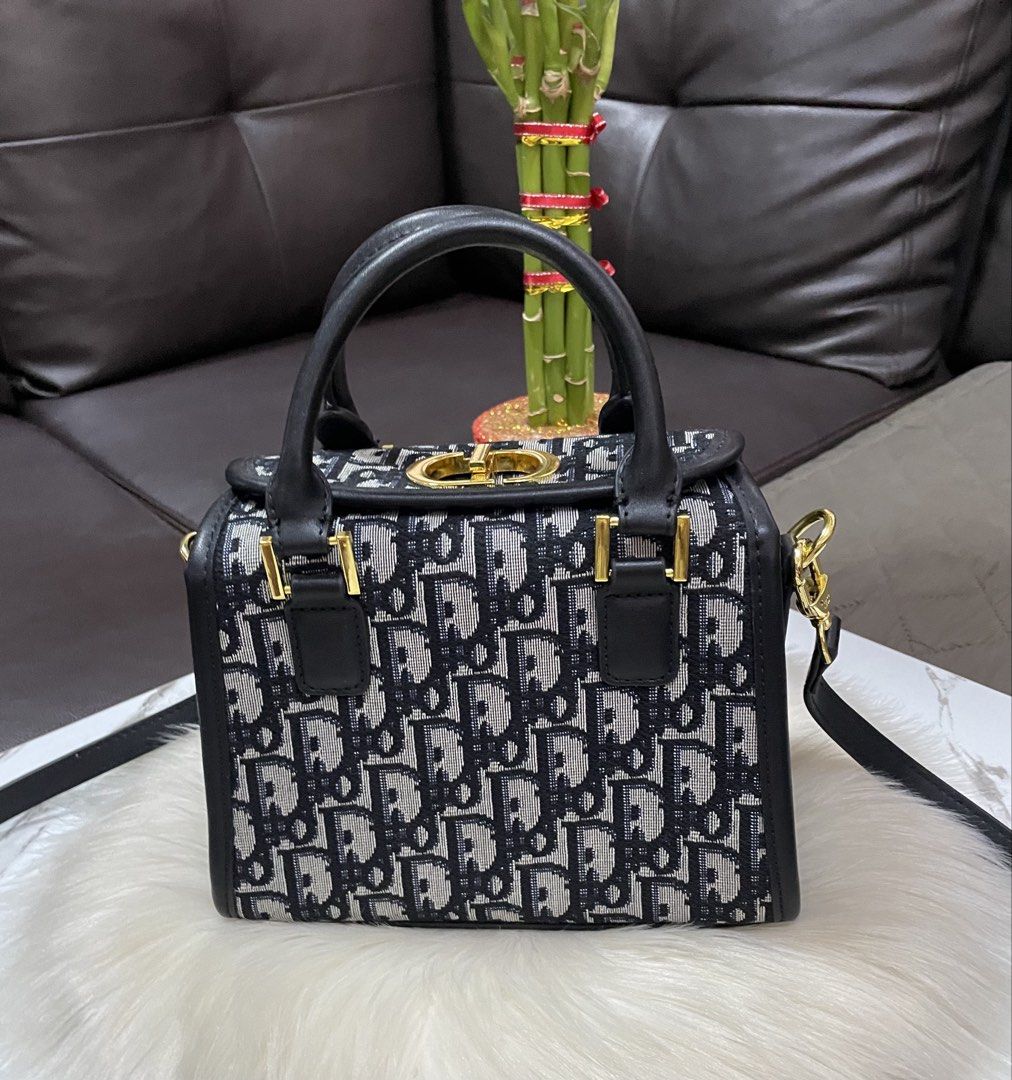 Dior Two Way Bag (Category: Cross-body Bags) located in Mandaue City. Submitted by ludz_0246 (Listing ID 1460652149, Image 2). Description: Gold Hardware Two way bag Etekita and logo Canvas In 20cm No Flaw Actual Photo.