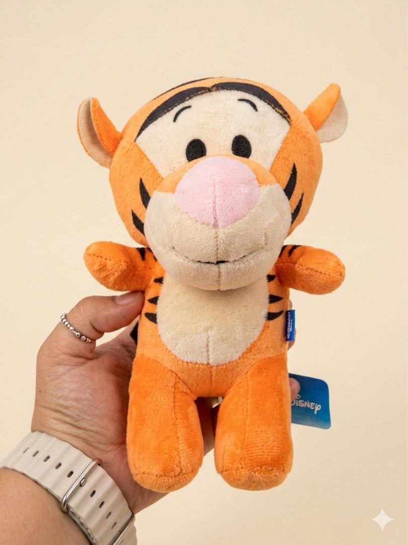 Disney Tsum Tsum Tigger Plush Toy (Category: Plushies & Soft Toys) located in Baguio. Submitted by cherylcaps95 (Listing ID 1460510042, Image 1). Description: - Authentic Disney Tigger plush toy - Brand new with tags still attached - Super soft and cuddly material - Ideal for any Winnie the Pooh enthusiast - Perfect size for decorating or playing - A must-have collectible!.