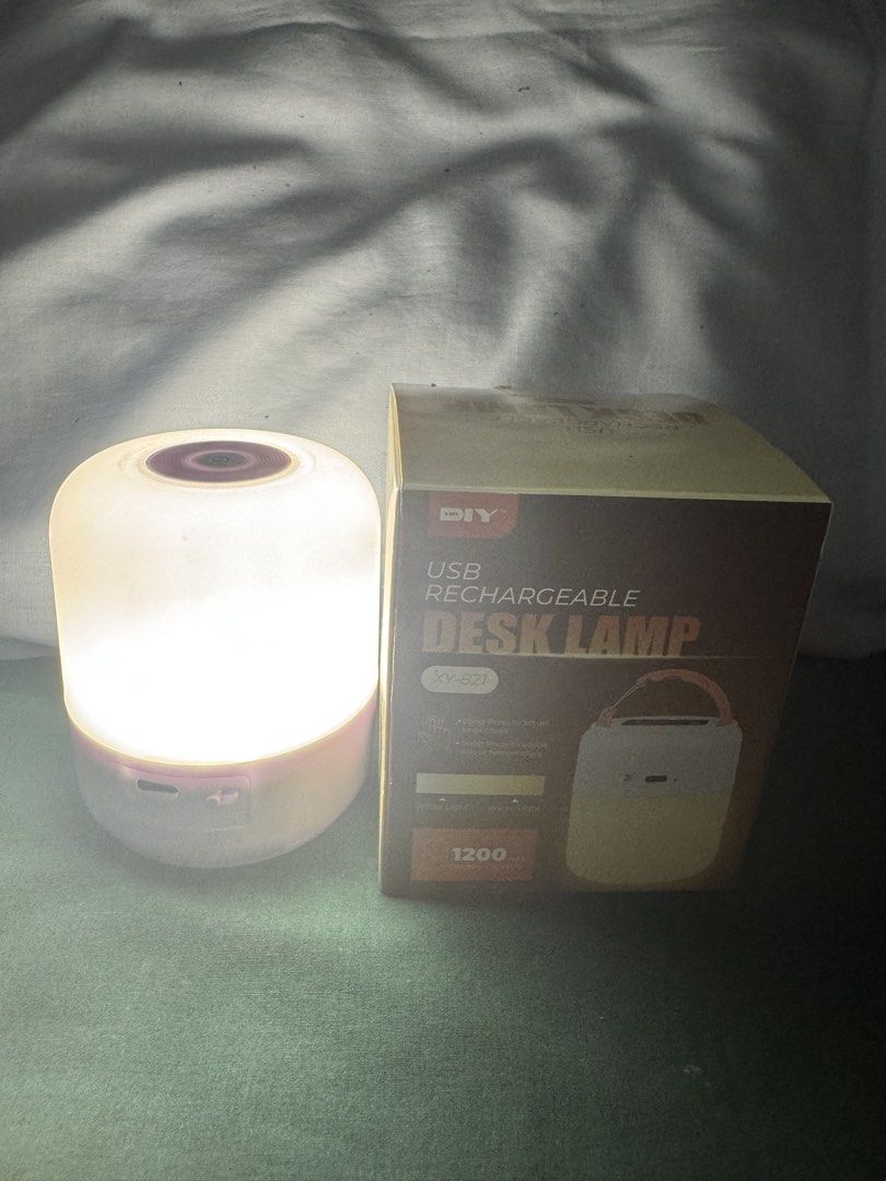 DIY USB Rechargeable Desk Lamp XY-821 (Category: Lighting) located in Quezon City. Submitted by jhosa888 (Listing ID 1460551721, Image 3). Description: - USB Rechargeable Desk Lamp (Model XY-821) - Dual Light Modes: White & Warm Light - Adjustable Brightness: Long press to dim/brighten - Easy Mode Switching: Short press - Long-lasting Battery: 1200mAh capacity - Ideal for Desk or Bedside Use.