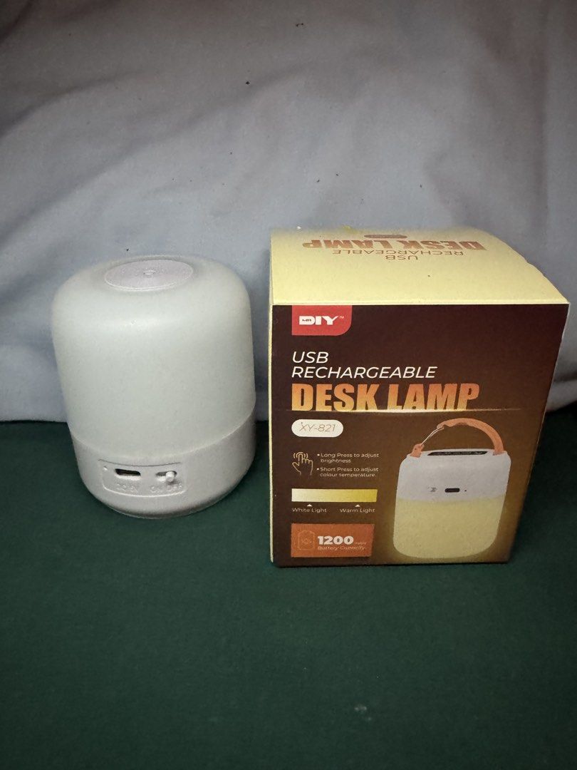 DIY USB Rechargeable Desk Lamp XY-821 (Category: Lighting) located in Quezon City. Submitted by jhosa888 (Listing ID 1460551721, Image 1). Description: - USB Rechargeable Desk Lamp (Model XY-821) - Dual Light Modes: White & Warm Light - Adjustable Brightness: Long press to dim/brighten - Easy Mode Switching: Short press - Long-lasting Battery: 1200mAh capacity - Ideal for Desk or Bedside Use.