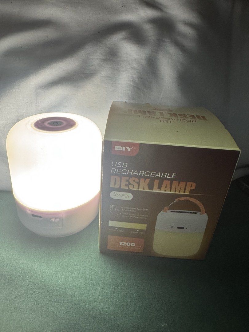 DIY USB Rechargeable Desk Lamp XY-821 (Category: Lighting) located in Quezon City. Submitted by jhosa888 (Listing ID 1460551721, Image 2). Description: - USB Rechargeable Desk Lamp (Model XY-821) - Dual Light Modes: White & Warm Light - Adjustable Brightness: Long press to dim/brighten - Easy Mode Switching: Short press - Long-lasting Battery: 1200mAh capacity - Ideal for Desk or Bedside Use.