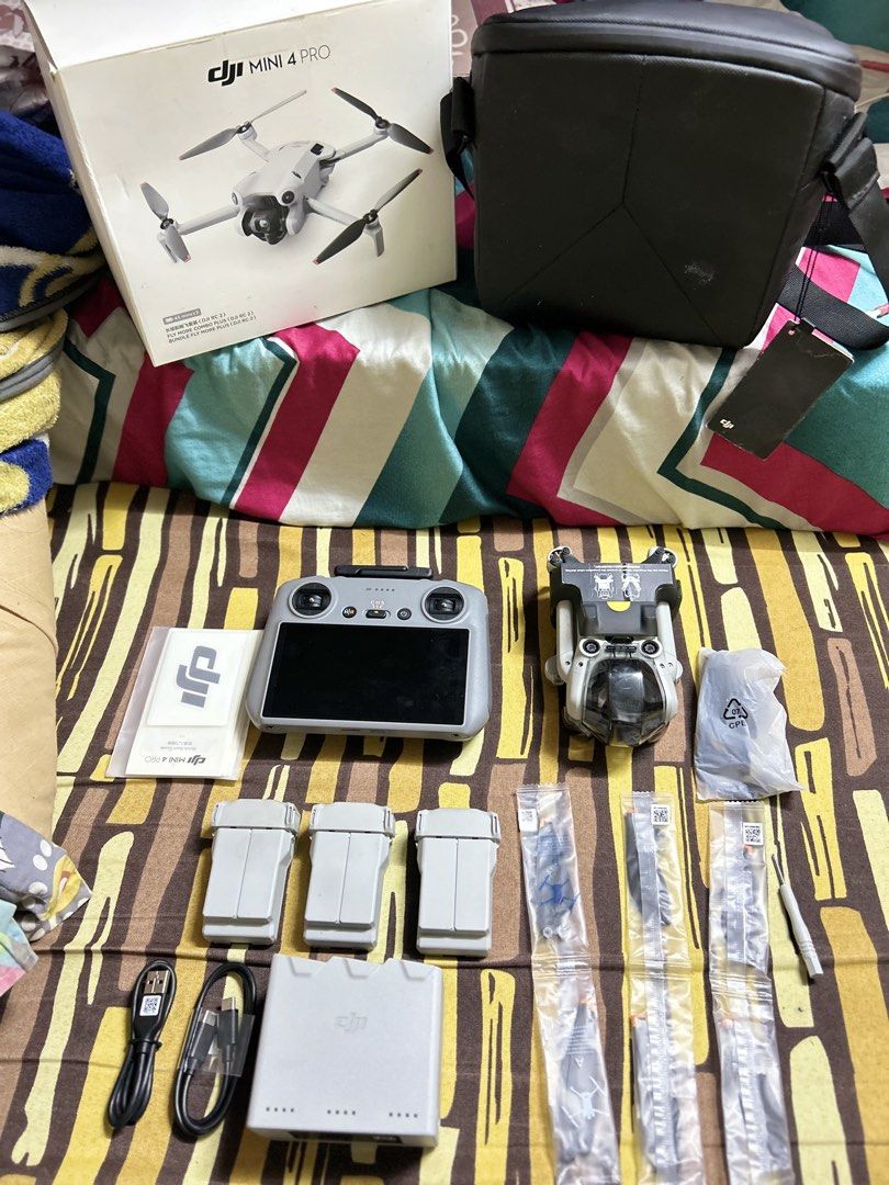 DJI mini 4 PRO (Category: Drones) located in Manila. Submitted by timelesspurse (Listing ID 1460647120, Image 3). Description: Selling my DJI Mini 4 Pro .. Well maintained and ready to used.. ✨ Complete package ✨ DJI RC 2 with built-in screen ✨ 3 batteries ✨ Charging hub ✨ Carrying case ✨ Extra propellers/accessories ✨ Original box & manuals Perfect for: 🎥 Content creators 📸 Photographers ✈️ Travelers 🏞️ Adventure & outdoor shots ₱40k NEGOTIAB
