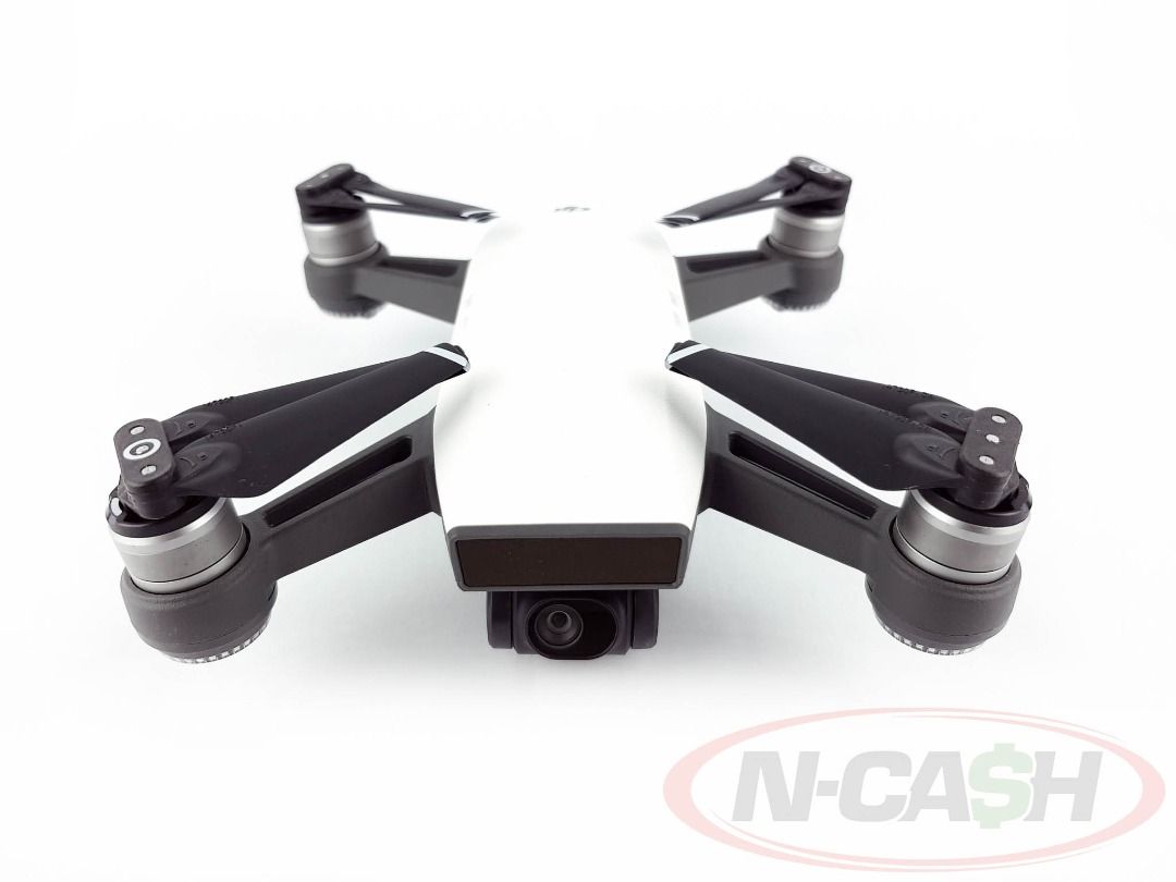 DJI Spark Fly More Combo (Category: Cameras) located in Quezon City. Submitted by luxury_by_n-cash (Listing ID 1460539223, Image 2). Description: DJI Spark Fly More Combo Appearance is at least 9 out of 10 Drone comes with remote controller, 2 pcs. intelligent flight battery, battery charging hub, charger and power cable, 4 pcs. propeller guards, 3 pcs. spare propellers, carrying bag, USB cable, and original box PhP 9800.