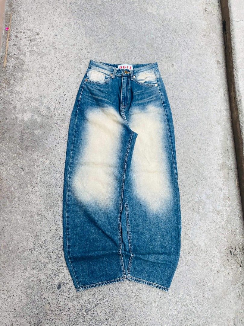 DOLL UP Distressed Wide Leg Jeans (Category: Jeans) located in General Santos City (Dadiangas). Submitted by ginn.ze (Listing ID 1460562080, Image 2). Description: - Brand: DOLL UP - Style: Distressed Wide Leg Jeans - Feature: Unique bleach wash effect - Fit: Wide leg, on-trend - Occasion: Casual wear - Styling tip: Pair with crop top or oversized tee - Condition: Ready for a new home.