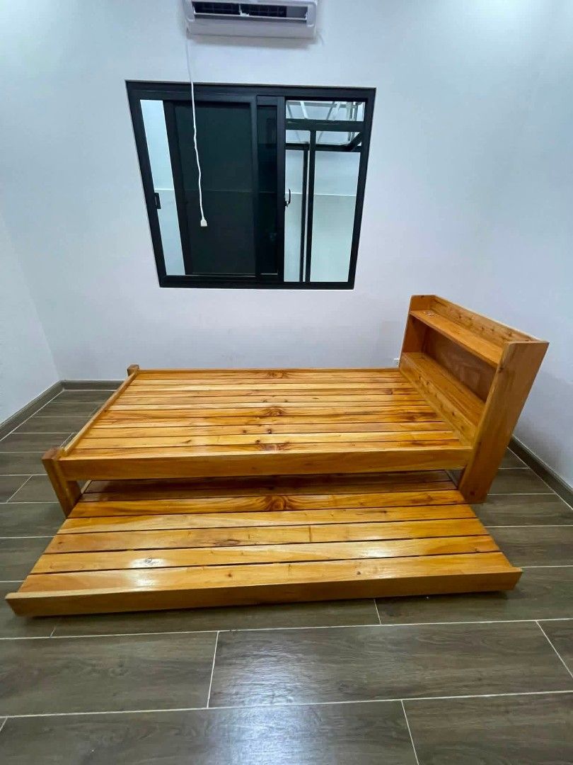 double frame with pull out (Category: Bed Frames & Mattresses) located in Manila. Submitted by rhoda_81 (Listing ID 1460609564, Image 1). Description: MADE TO ORDER PINEWOOD WOOD ,PLYBOARD bEdframe with selve headboard Single or double with pull out varnesh any paint color request are available ✔100℅ Quality ✔Free delivery On Selected Areas ✔Open for Cuztomized design/size ✔May loffbed/daybed/Chair/table/kitchen cabinet are accepted we also offer