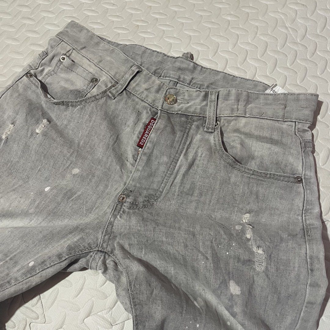 DSQUARED2 Grey Distressed Paint Splatter Denim Jeans (Category: Jeans) located in Zamboanga. Submitted by selvege (Listing ID 1460647265, Image 3). Description: - Grey DSQUARED2 denim jeans - Features paint splatters and distressed details - Button fly closure - Made in Italy -size 30-33 -Excellent condition -no issue.