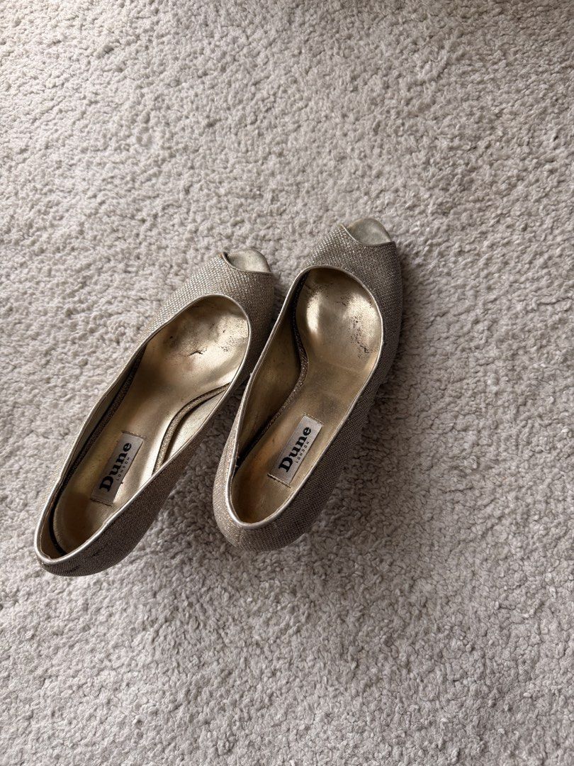 Dune London Peep Toe Glitter Heels (Category: Heels) located in Muntinlupa City. Submitted by pattti_gv (Listing ID 1460539184, Image 2). Description: - Brand: Dune London - Style: Gold glitter peep toe heels - Heel height: Low (comfortable for events) - Condition: Some wear on inside sole and heel - Occasion: Great for parties or a night out.