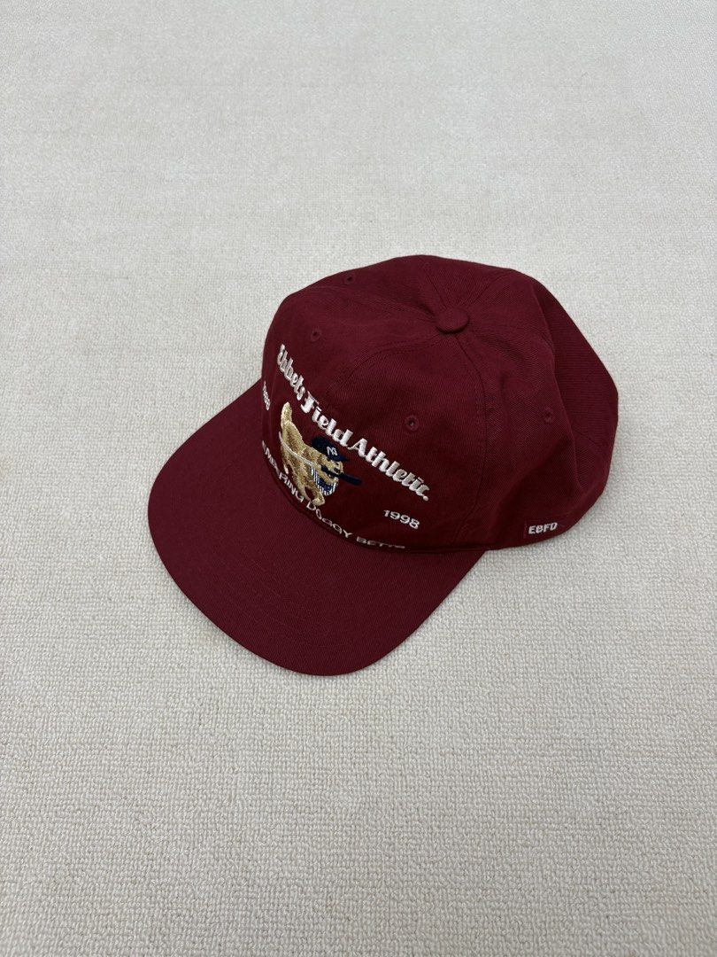 Ebbets Field Athletic Remembering Doggy Betts Cap Burgundy (Category: Caps & Hats) located in Manila. Submitted by porma.market (Listing ID 1460518900, Image 2). Description: - Brand: Ebbets Field Athletic - Color: Burgundy - Design: 'Remembering Doggy Betts' embroidery with dog graphic - Details: '1988' and '1998' accents - Features: Adjustable strap at the back - Interior Tag: American flag and Ebbets Field Athletic branding - Authentic.