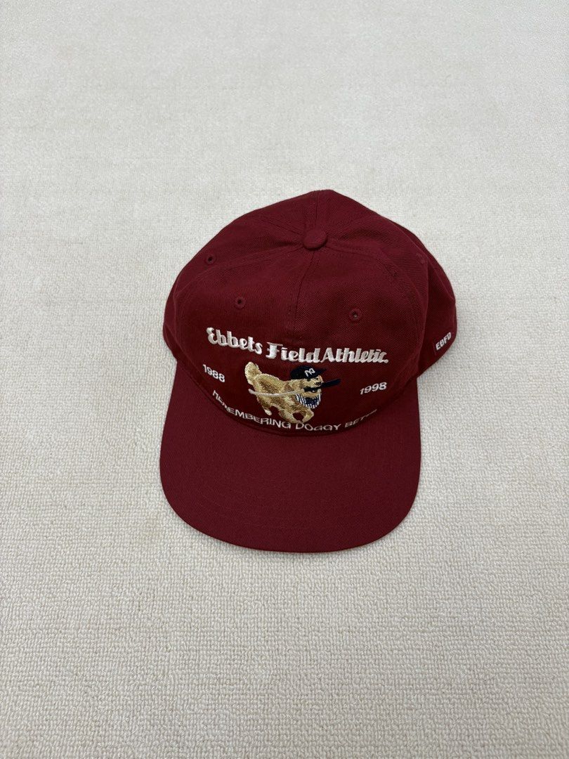 Ebbets Field Athletic Remembering Doggy Betts Cap Burgundy (Category: Caps & Hats) located in Manila. Submitted by porma.market (Listing ID 1460518900, Image 3). Description: - Brand: Ebbets Field Athletic - Color: Burgundy - Design: 'Remembering Doggy Betts' embroidery with dog graphic - Details: '1988' and '1998' accents - Features: Adjustable strap at the back - Interior Tag: American flag and Ebbets Field Athletic branding - Authentic.