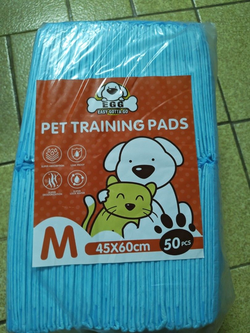 EGG Pet Training Pads M Size 45x60cm 50pcs (Category: Homes & Other Pet Accessories) located in Manila. Submitted by tes07 (Listing ID 1460549994, Image 1). Description: - 2 packs of Pet Training Pads - Size: Medium (M) - Quantity: 50 pieces per pack (100 pieces total) - Dimensions: 45x60cm - Features: Super absorbent, leak-proof - Benefits: Ideal for pet training, keeps your place clean, easy to use if u get bout 250.
