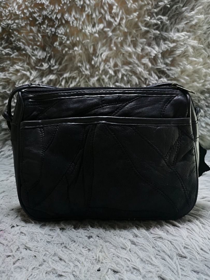 Embossed Pattern Black leather Crossbody Bag (Category: Cross-body Bags) located in Santa Cruz. Submitted by jmy_surplus.2 (Listing ID 1460587940, Image 1). Description: Size ; L- 7.4 W - 10 Color ; Black Type ; Crossbody Bag Brand ; No brand Material ; Leather Style ; Black Zipper Closure leather Crossbody Bag LR 167 JMY 1 Batch #219.