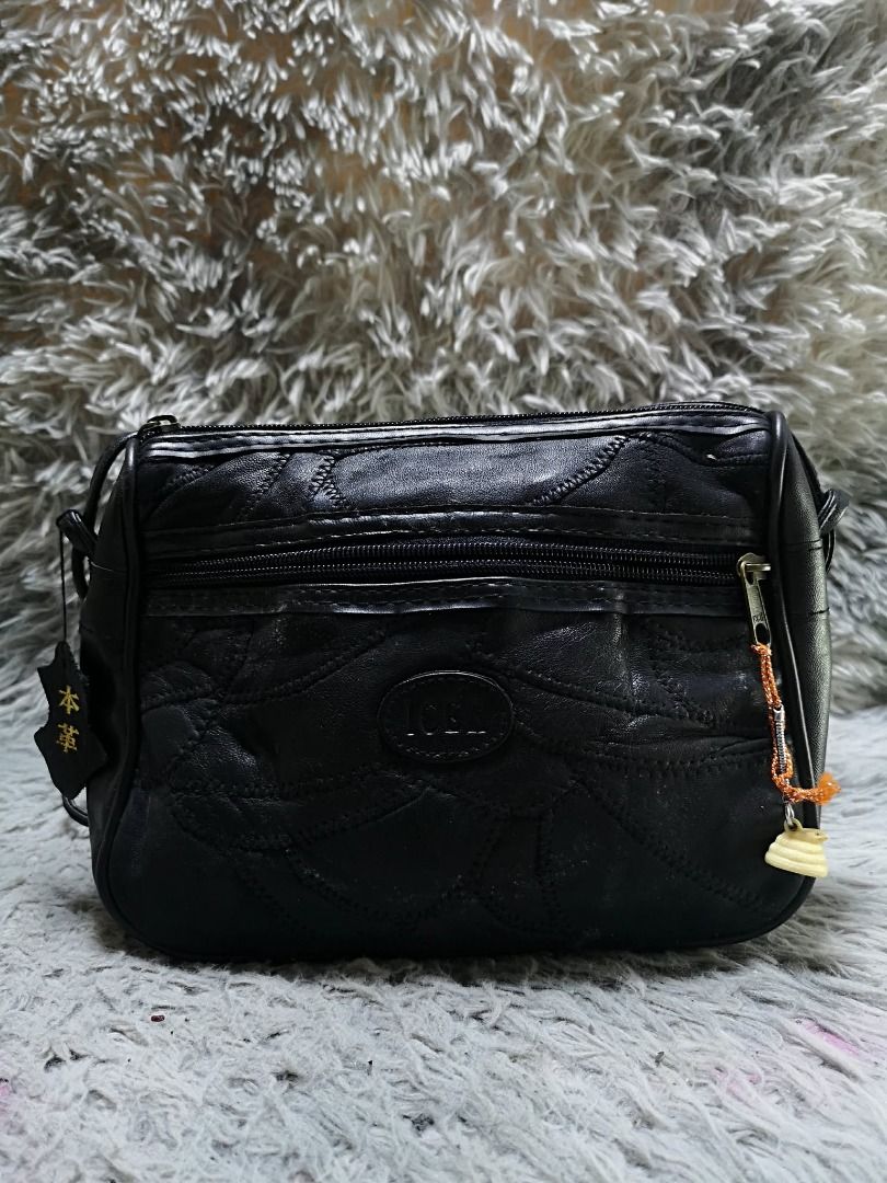 Embossed Pattern Black leather Crossbody Bag (Category: Cross-body Bags) located in Santa Cruz. Submitted by jmy_surplus.2 (Listing ID 1460587940, Image 2). Description: Size ; L- 7.4 W - 10 Color ; Black Type ; Crossbody Bag Brand ; No brand Material ; Leather Style ; Black Zipper Closure leather Crossbody Bag LR 167 JMY 1 Batch #219.