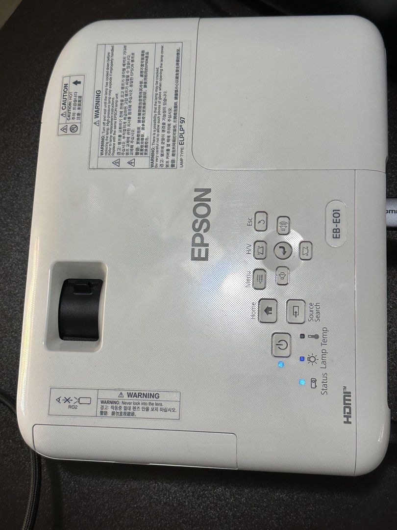 Epson Projector EB-E01 model (Category: Projectors) located in Dinalupihan. Submitted by yenfinds (Listing ID 1460644894, Image 2). Description: Epson EB-E01 XGA 3LCD Projector Reliable and portable projector ideal for presentations, classrooms, meetings, and home use. 3,300 lumens brightness -XGA resolution (1024 × 768) -3LCD technology -Built-in 2W speaker -Vertical keystone correction -HDMI and VGA connectivity -Compact and easy to set up.